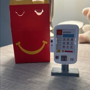 McDonald's Red Happy Meal Box with White and Gray Toy